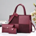 Burgundy three piece women handbag set detail view, featuring tote, clutch and chic blocks. - Wine Red