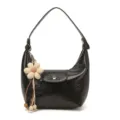 Black crinkled patent leather hobo shoulder bag with cute daisy flower pendant charm. - Single Bag / Black
