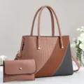 Detailed view of the stylish women's color-block crocodile pattern handbag with matching wallet. - Pink