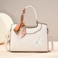 Chic embroidered women handbag variant in beige with elegant floral design and stylish handle scarf - Off White