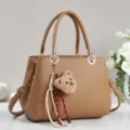 Brown textured tote bag with cute bear charm and tassel, stylish large capacity handbag for women. - Dark Khaki