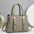 Women's stylish canvas handbag with green leather trim, top handle and shoulder strap. - 28x13x20cm / Green