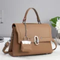 Brown leather shoulder handbag detail, elegant top handle and chic metal lock closure. - Khaki