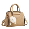 Stylish khaki women handbag with elegant embossed geometric pattern and cute fluffy plush charm. - Khaki