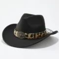 Closeup view of black wool western cowboy hat featuring leopard band and bull skull buckle. - Adult 57cm / Black