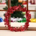 Guirlande de Noël rouge avec étoiles scintillantes, idéale pour la décoration festive de porte. - Rouge