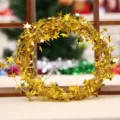 Guirlande de guipure de Noël dorée avec étoiles, idéale pour la décoration de porte et sapin. - Or