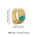 Closeup of wide gold textured metal cuff bracelet with turquoise stone detail and size specs. - Vintage Geometric Resin Bracelet (B3980)