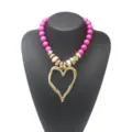 Detailed view of trendy sweet and cool large heart acrylic beaded clavicle chain necklace. - Rose Red