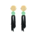 Detailed view of bohemian long tassel earrings with gold disc and green bead elements. - Earrings / Light Green