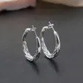 Elegante zilverkleurige geweven oorbellen met ring, minimalistisch en chic design. - 30mm*925 silver