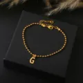 Goudkleurige kralenketting armband met beginletter G hanger, chique minimalistische sieraden voor dames. - Letter G