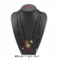 Collar largo bohemio con cordón negro, cuentas doradas y colgantes sol luna para mujer. - Negro