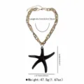 Chunky gold chain necklace with a stylish black resin starfish pendant, beach vacation style. - Black