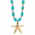 Summer beach vacation starfish necklace featuring turquoise beads and gold pendant for women. - N13394