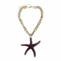 Close-up view of a gold chunky chain necklace featuring a dark purple resin starfish pendant. - Dark Red