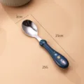 Baby stainless steel training spoon with space rocket pattern and ergonomic blue handle. - Round Handle Spoon / Sapphire Blue