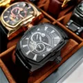 Men's tonneau quartz watch with black dial and leather strap, detailed close-up view. - Black Strap Black Case Black Face