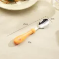 Children stainless steel spoon with yellow silicone soft handle, cute cartoon design for baby feeding. - Yellow Lion Spoon