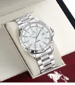 Luxury men's silver mechanical watch detail, mother of pearl dial and rhinestone markers in box. - Silver Steel Band White Mother-of-Pearl Dial