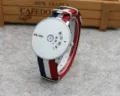 Minimalist creative quartz wristwatch for men and women with stylish colorful nylon strap. - Blue White Red Canvas Strap White Face