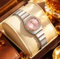 Fashion quartz wristwatch for women with pink crystal-paved dial, silver and rose gold strap. - Pink
