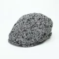 Detailed view of black and white floral jacquard ivy cap with a side metal buckle. - M (56-58cm) / Black