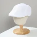 Dettaglio di coppola bianca in rete traspirante, cappello leggero con trama e vestibilità cura. - M（56-58cm） / Bianco
