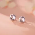 Rosa Zirkonia Ohrstecker aus Sterlingsilber, klassisches rundes vier Krappen Design für Damen. - 990 Silber / Rosérosa