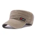 Close-up detail of the vintage washed cotton flat top military cap with side label trim. - Adjustable / Khaki