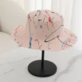 Flat-top straw hat with colorful paint splatter design, perfect for summer beach and travel sun protection. - M (56-58cm) / Pink