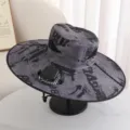 Detailed view of the solar-powered fan fishing hat, grey camouflage print, wide brim sun protection. - 1 Fan / 300MA / Grey Square