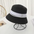 Elegant black straw bucket hat for women, featuring pearl trim and rhinestone M logo. - M (56-58cm) / Black