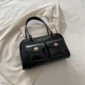 Sac à bandoulière en cuir noir pour femme avec deux poches avant et poignées chic - Noir
