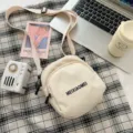 Chique crème canvas schoudertas voor dames, stijlvolle casual kleine crossbody tas dagelijks. - Zonder hanger / Wit