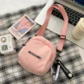 Pink canvas crossbody bag for women, cute shoulder bag with adjustable strap and stylish letter print. - Daisy Shoes Pendant / Pink