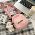 Korean style pink canvas crossbody bag for women, cute shoulder bag with bear pendant. - Shy Bear / Pink