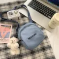 Cute canvas crossbody bag for women, casual daily shoulder bag with small bear pendant and stylish print. - Shy Bear / Blue