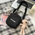Black canvas crossbody bag with cute bear pendant and letter print for daily use. - Bear / Black