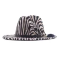 Zebra print fedora hat detail featuring stylish black belt and gold metal hardware accent. - M (56-58cm) / Beige