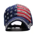 Close-up detail of the rhinestone embellished US flag denim baseball cap front design. - Adjustable / Blue