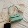 Stijlvolle mintgroene schoudertas voor dames, elegante lederen tas met mooie strik. - Groen