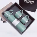 Stainless steel vacuum flask set with one large bottle and two cups, ideal gift choice. - Green Zirconia Set