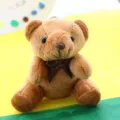 Simpatico portachiavi orsetto di peluche marrone 10cm con fiocco, morbido giocattolo regalo. - Altezza Seduta 10cm / Marrone scuro