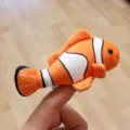 Clownfish plush finger puppet detail shot, cute ocean animal toy for interactive play kids. - Clownfish Finger Puppet