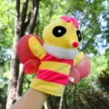 Cute plush insect hand puppet toy, yellow pink striped design with sparkly wings for kids play. - Bee Hand Puppet