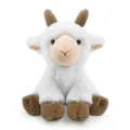 Gros plan d'une jolie peluche de chèvre assise avec de la fourrure blanche et des cornes. - Poupée en Peluche Chèvre Assise / Hauteur Assise Environ 22cm