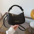 Zwarte minimalistische halve maan schoudertas, stijlvolle casual PU lederen crossbody tas. - Zwart zonder Hanger