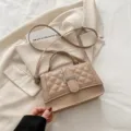 Gewatteerde schoudertas voor dames, chique beige PU lederen handtas met metalen H-sluiting. - Khaki