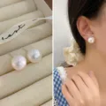 Elegante große runde Perlen-Ohrstecker mit 925er Silberstiften für Damen im Alltag. - Perle 14mm